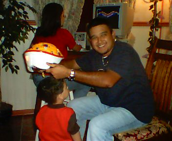 Andrae had just tried on the kid's helmet 