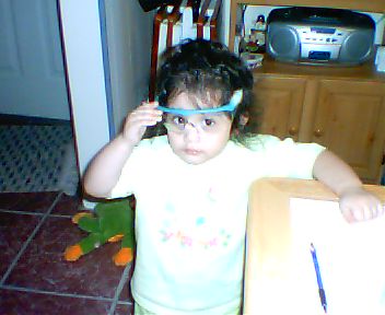 Tea trying on some goggles